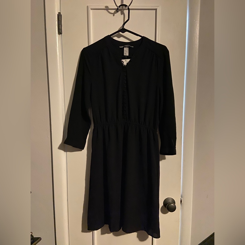 Black button-up gothic dress.